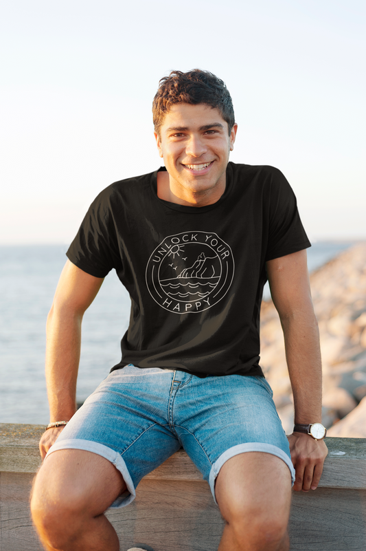 T-shirt capturing joy amidst rocky coast scenery.